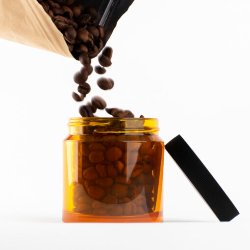 Comandante bean jar pouring beans