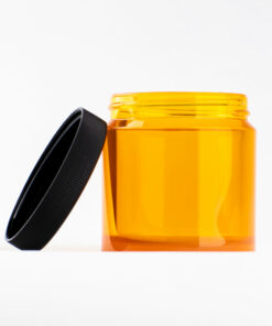 Comandante bean jar yellow with lid on side