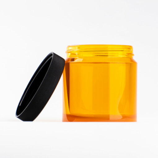 Comandante bean jar yellow with lid on side
