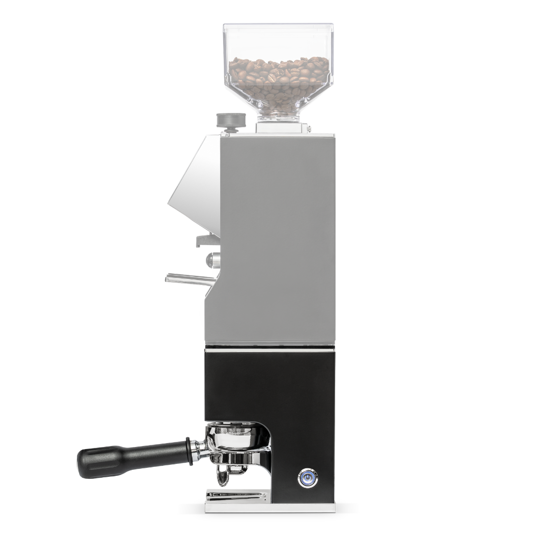 Eureka Mignon Automatic Tamper, angled view showing the portafilter fork