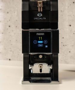 Eureka Mignon Automatic Tamper on a home espresso counter