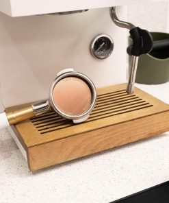 Portafilter with Cafe Concetto Puck Screen at the espresso machine