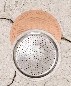 Cafe Concetto Superfine Moka Disc 57.5 mm with a moka pot filter basket