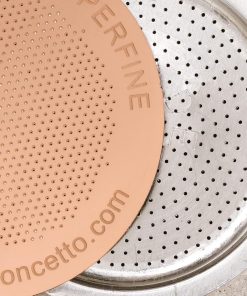 Close-up of the Cafe Concetto Superfine Moka Disc and moka pot filter plate
