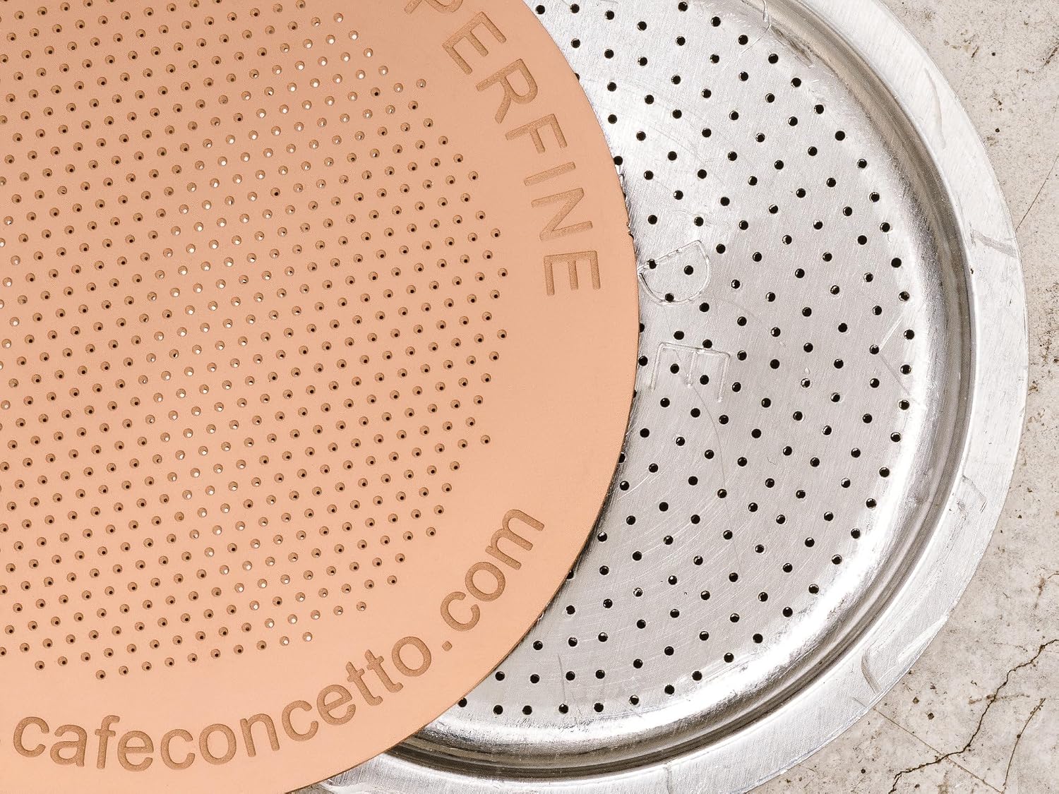 Close-up of the Cafe Concetto Superfine Moka Disc and moka pot filter plate