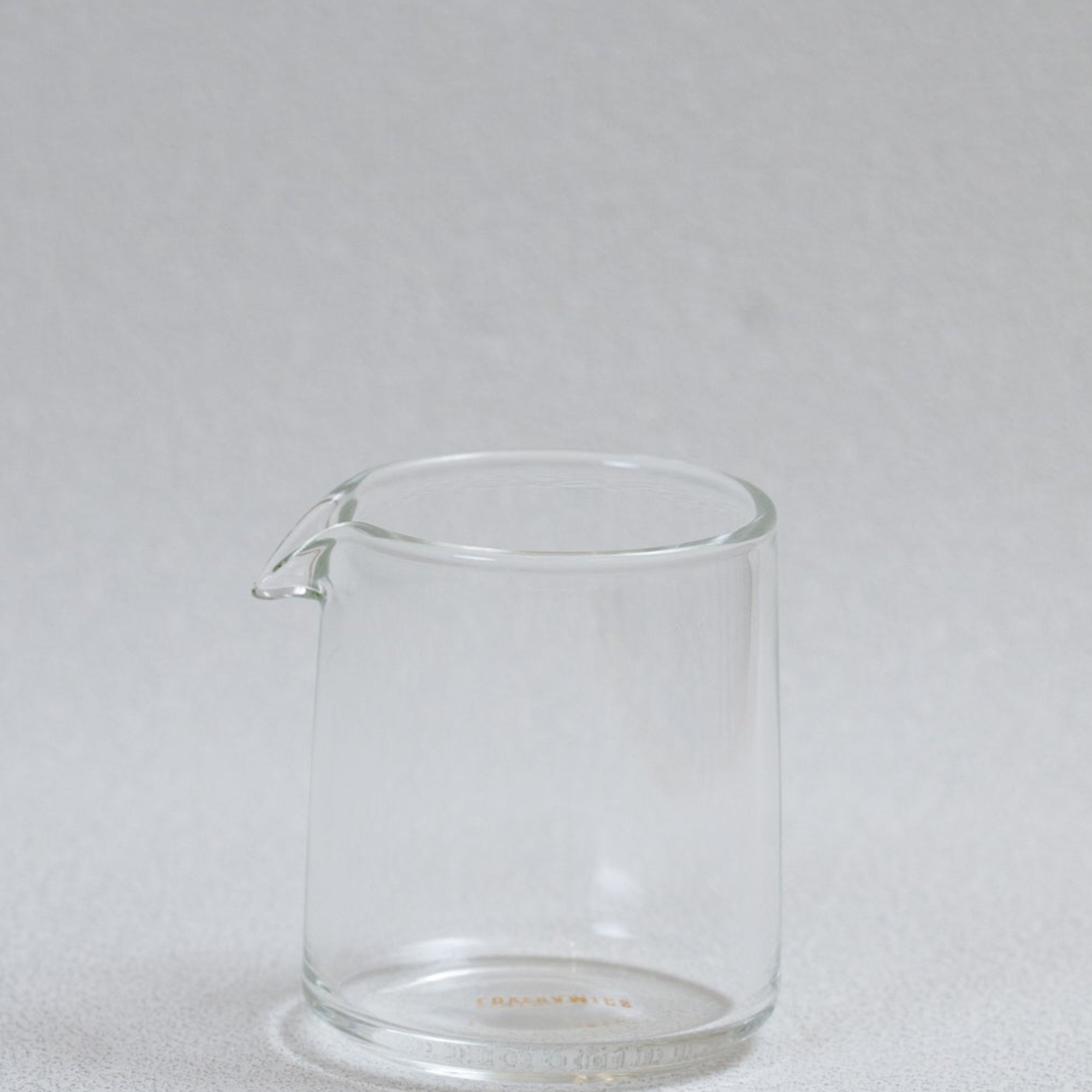 Side view of Loveramics 100ml glass espresso shot jug