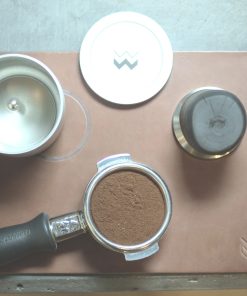 Natural Weber Workshops leather tamping mat with portafilter, tamper and Blind Shaker, seen from above